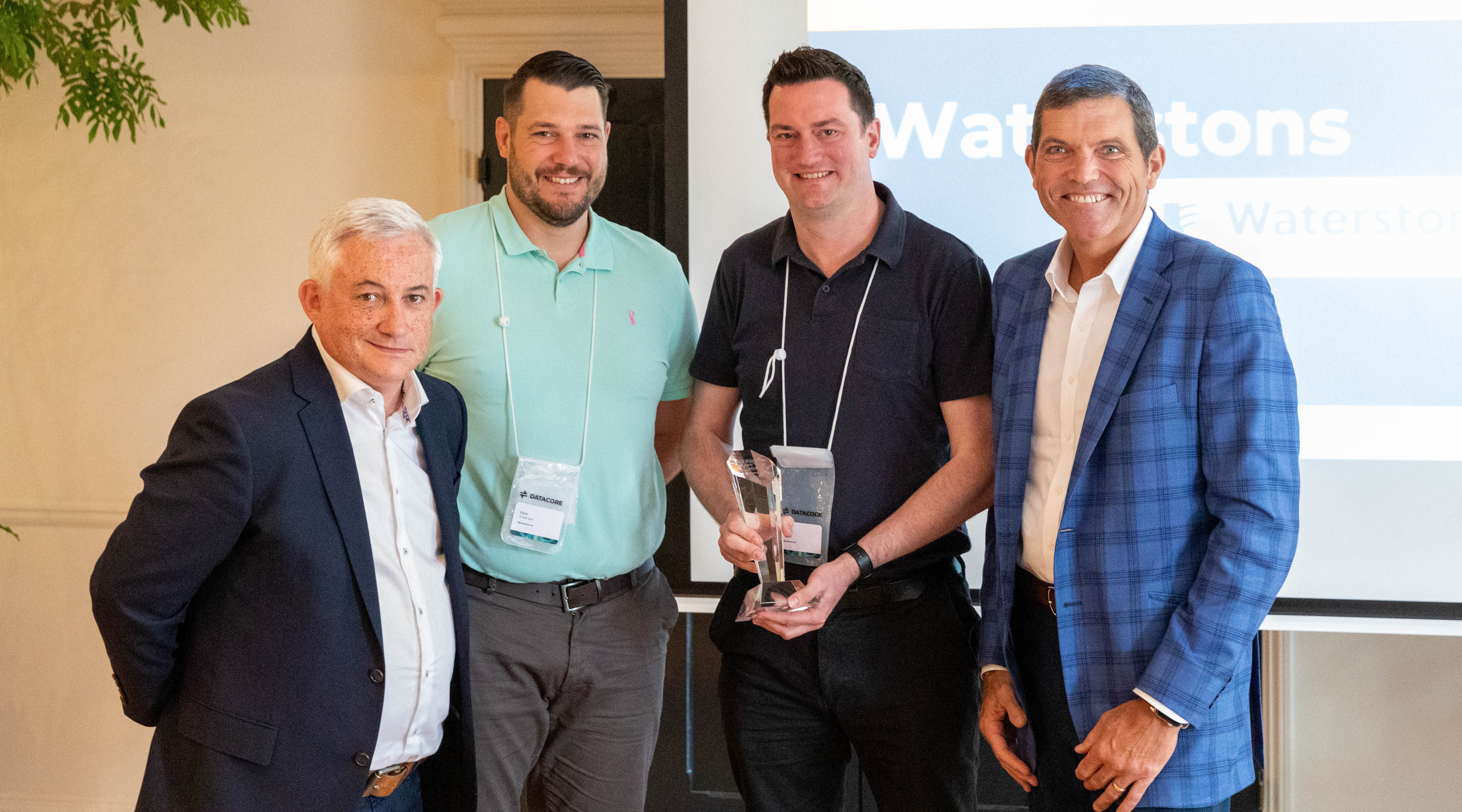 Chris Anderson and Michael Stirrup being presented with the DataCore Partner of the Year Award